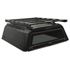 platform rack on a aluminum truck cap. roof platform installed on a gullwing aluminum truck canopy front side
