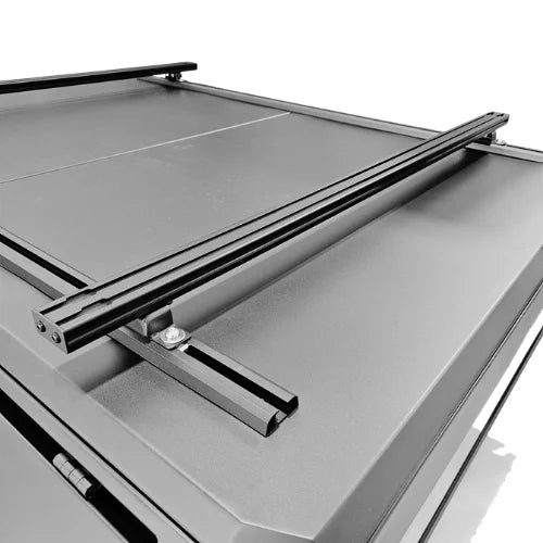 Roof rack system on a vehicle with t tracks on a white background