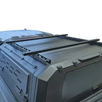 Roof rack system on a vehicle with t tracks on a white background